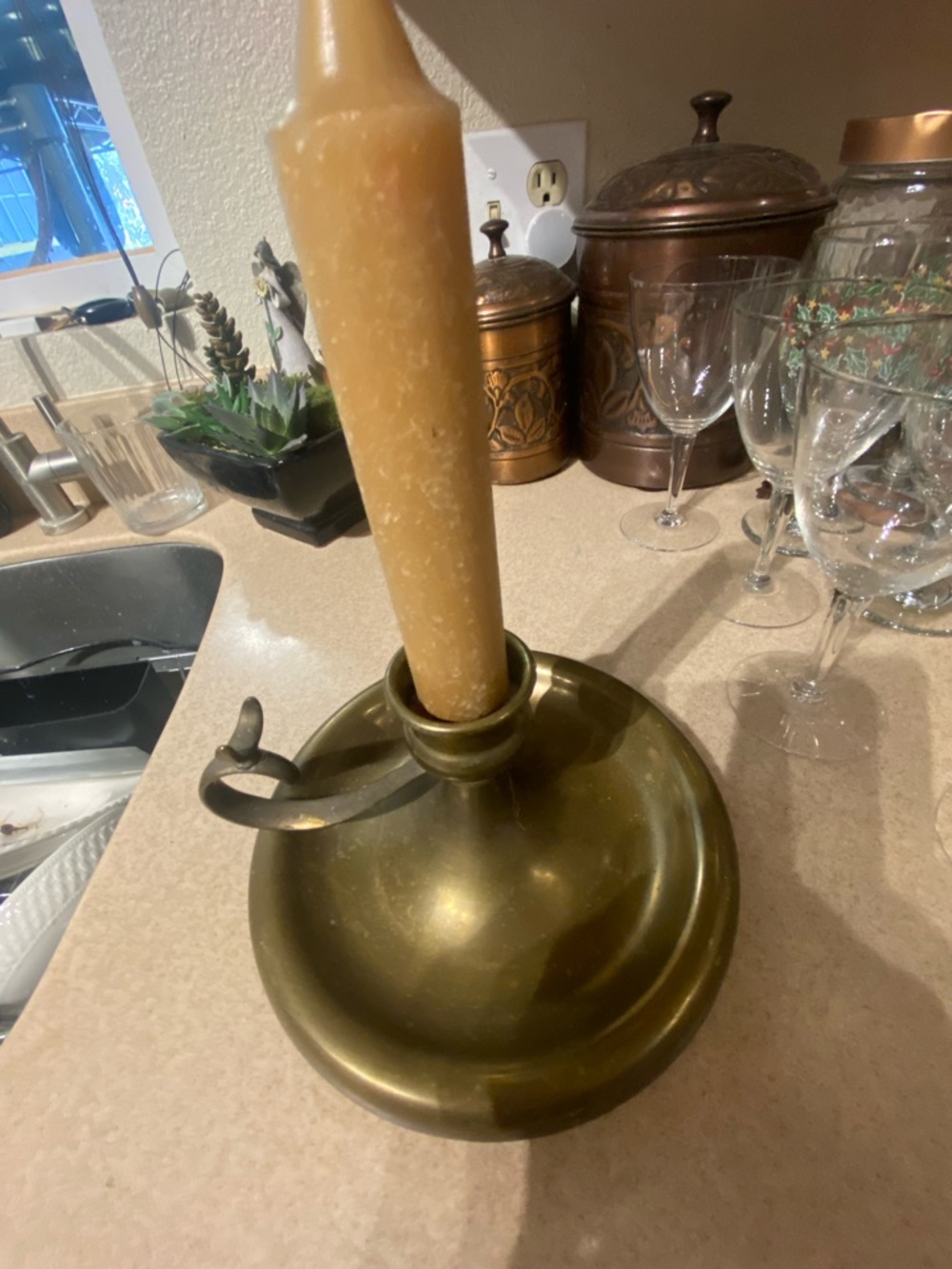 Vintage brass candle holder.  Chamberstick  style with fingerloop for carryin